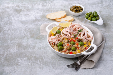 Quinoa with vegetables and squid tentacles