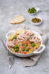 Quinoa with vegetables and squid tentacles