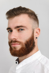 Obraz premium Image closeup of young handsome man posing and looking at camera