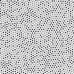 Modèle sans couture avec de petits cercles noirs. Fond de points minimalistes. Texture vecteur noir et blanc.