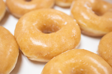 Background of glaze doughnut in a box