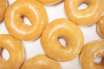 Background of glaze doughnut in a box
