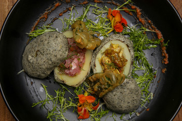 Stir fried potatoes in seaweed crust stuffed with tuna tartar. Exquisite dish. Creative restaurant...