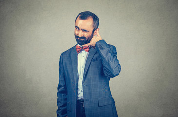 man making showing call me gesture sign with hand
