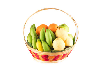 fresh orange, Chinese pear, banana in bamboo wicker basket on white background fruit health food isolated