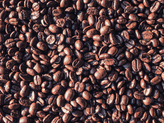 Roasted Thai coffee beans texture background