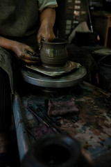 Sculpting clay, making hands, Thai folk ways