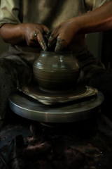 Sculpting clay, making hands, Thai folk ways