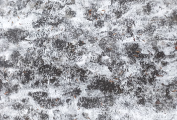 Winter road in the snow. Foot prints.