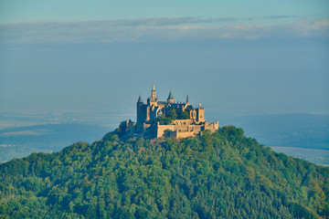 Fototapeta na wymiar Hilltop Hohenzollern Castle on mountain top in Germany