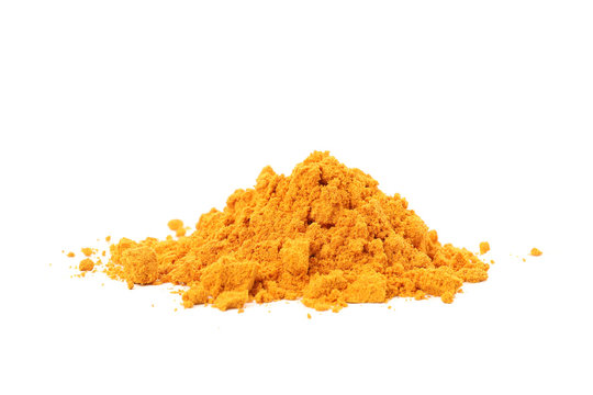Fragrant turmeric powder heap isolated on white background