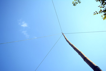the fisherman build fishing tool with bamboo pole pull by small rope on the top near the river and...