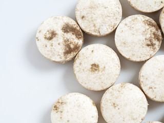 Expired tablets medicine on white background. Fungus on medicine dangerous to use.
