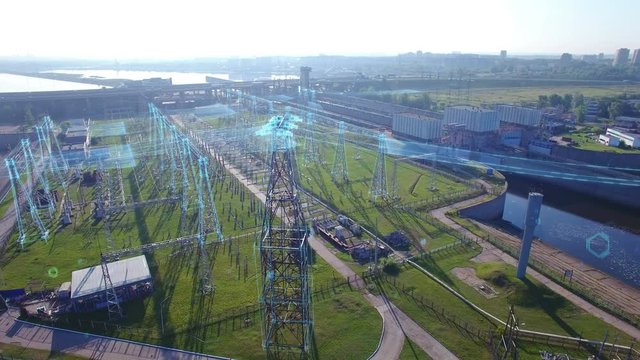 An aerial circular orbit view, high voltage electric power tower with infographic power flows, hydroelectric power station and electric substation with tall pylons and hog voltage distribution cables.