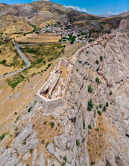 Aerial view of Kahta Castle, Kalesi. The Yeni Kale Fortress in Eski Kahta is perched atop a hill with a steep slope. Walls of the manor surround the entire hill. Very close to Mount Nemrut. Anatolia. 