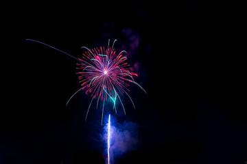 Beautiful colorful isolated firework display for celebration happy new year and merry christmas on black background