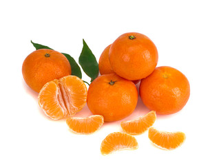 Ripe mandarin close-up on a white background. Tangerine orange and slices on a white background.