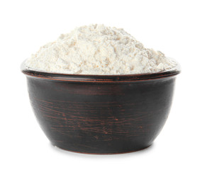 Bowl with flour on white background