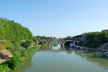 Fototapeta na wymiar Bridges over the Tiber river in Rome - Italy