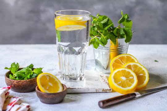 Photo of fresh cool lemon mint water. Infused water. Cocktail. Detox drink. Health care. Fitness. Summer drink. Still life photography. Image.
