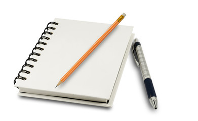 Blank notebook with pen and pencil isolated on white background.