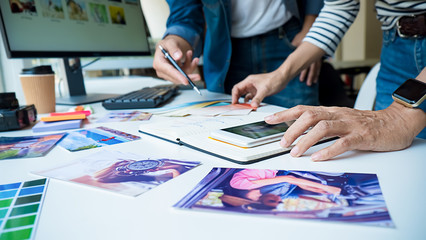 Advertising agency designer creative start-up team discussing ideas in office. 