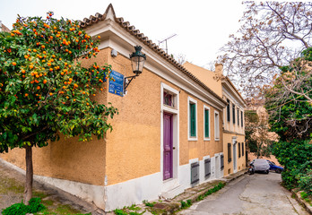 Athens / Greece - February 1 2014: The junction of Prytaneiou st and Theoreias st in the old historical neighborhood of Plaka, clustered around the northern and eastern slopes of the Acropolis.