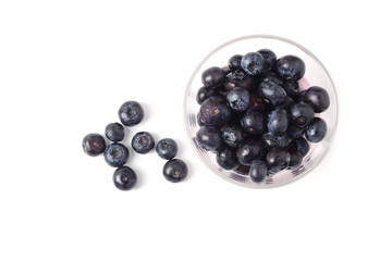 Top view blueberries fruit in glass isolated on white background.High vitamin Anthocynins benefit for heart and blood circulatory system