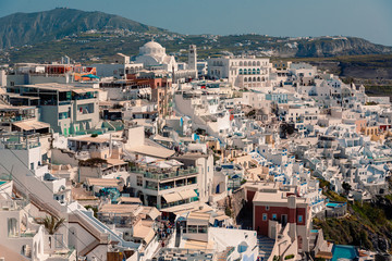 Panoramic view on the Fira capital of Santorini at summer sun light