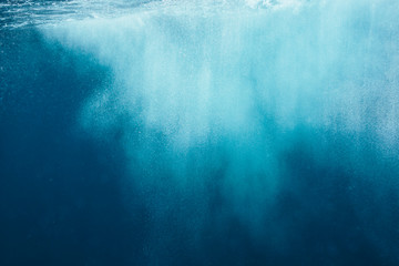 Underwater spray in blue ocean, Fiji, Pacific Ocean