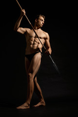 Young warrior holding spear.