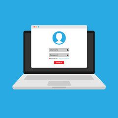 login form, the login page opens in a web browser window on the laptop screen.