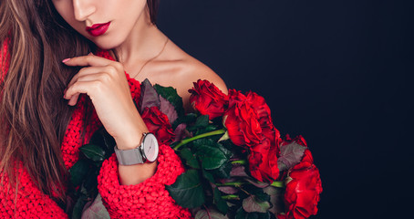 Valentines day. Woman holding bouquet of red roses. Beautiful girl received romantic present. Flowers delivery. Space