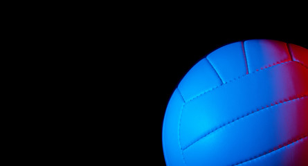 Volleyball ball isolated on black background. Blue neon Banner Art concept