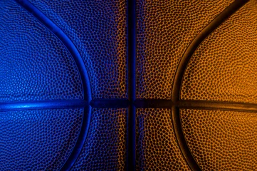 Gardinen Closeup detail of basketball ball texture background. Blue neon Banner Art concept © Augustas Cetkauskas