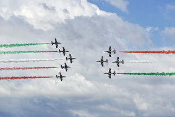 Italian Air Force aerobatic demonstration team Frecce Tricolori flying display during air show...