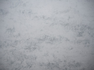 Gray textured blank watercolor paper sheet, abstract background.