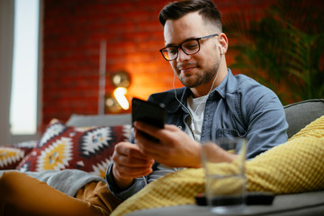 Young man having a video call. Handsome man talking on his smartphone.