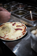 Chef Making homemade Pizza
