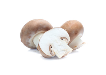 Fototapeta premium Fresh champignon mushrooms isolated on white