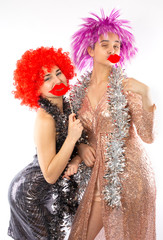 Attractive playful young women ready for carnival parties. Lifestyle and the concept of friendship:...