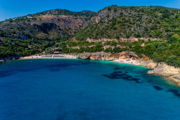 Fototapeta na wymiar Aerial drone bird's eye view of of Mega Drafi Beach with turquoise sea in Parga area, Ionian sea, Epirus, Greece