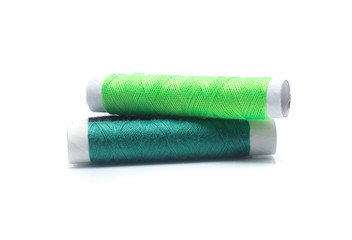 Spools with color threads isolated on white background