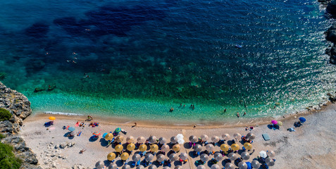 Aerial drone bird's eye view of of Mega Drafi Beach with turquoise sea in Parga area, Ionian sea, Epirus, Greece