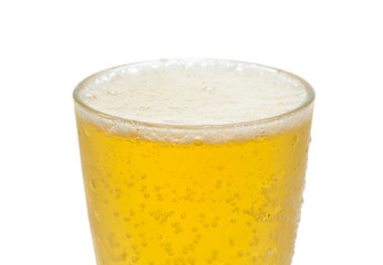 Glass of cold beer on a white background