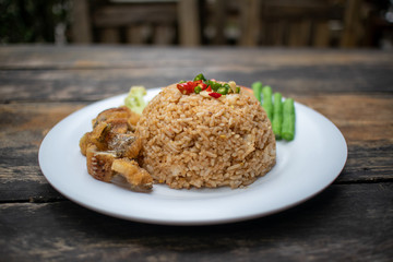 Fried Rice with Shrimp paste on white dish.