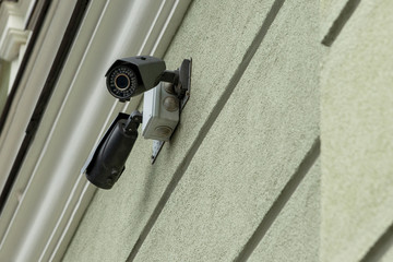 Security camera on the front of the house. Selective focus.