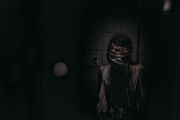 Portrait of asian woman make up ghost face,Horror scene,Scary background,Halloween poster