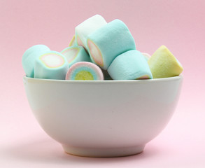 colorful marshmallows candy  on pink background