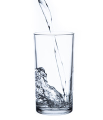 pouring water isolated on a glass on white background
